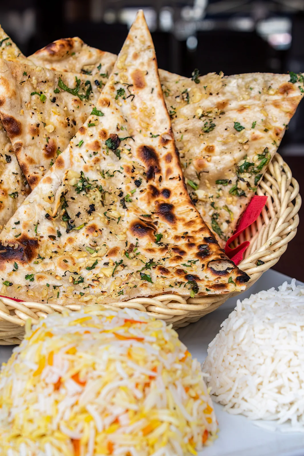 Indian curry and naan spread at La Nueva